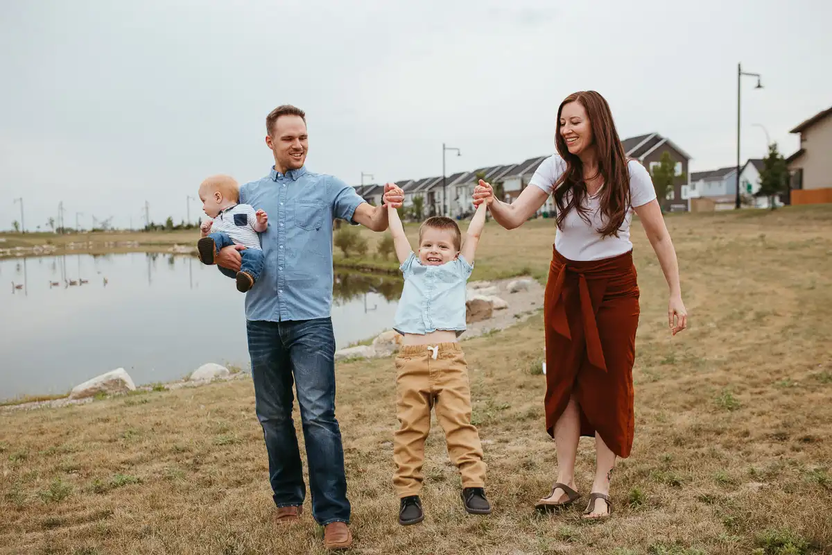 a family holding hands